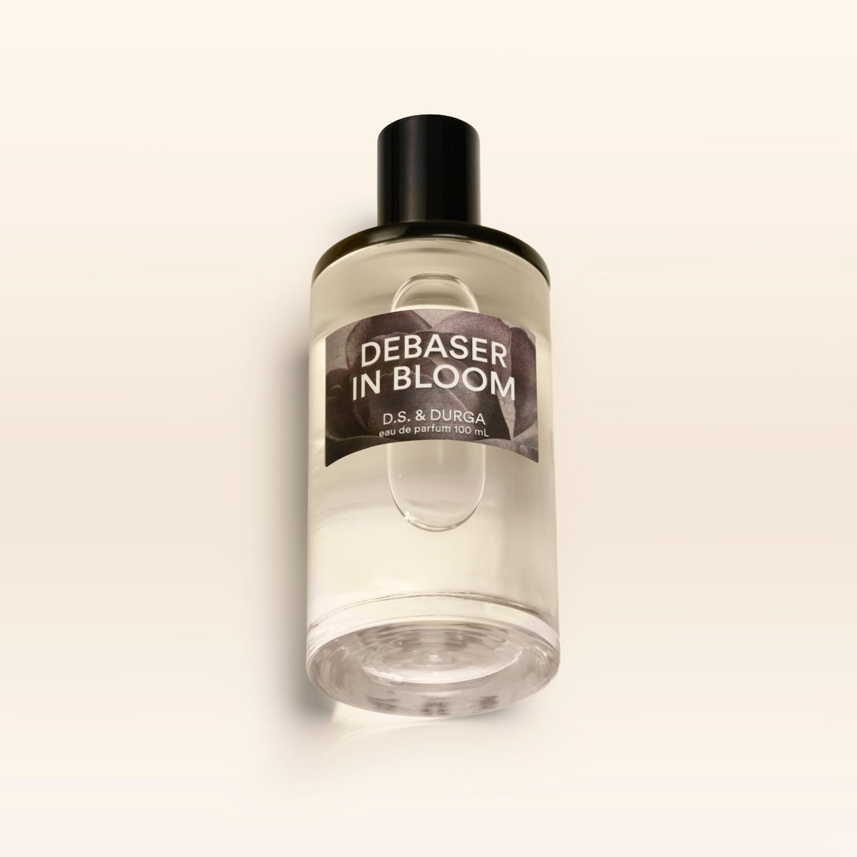 A 100 mL bottle of Debaser in Bloom perfume